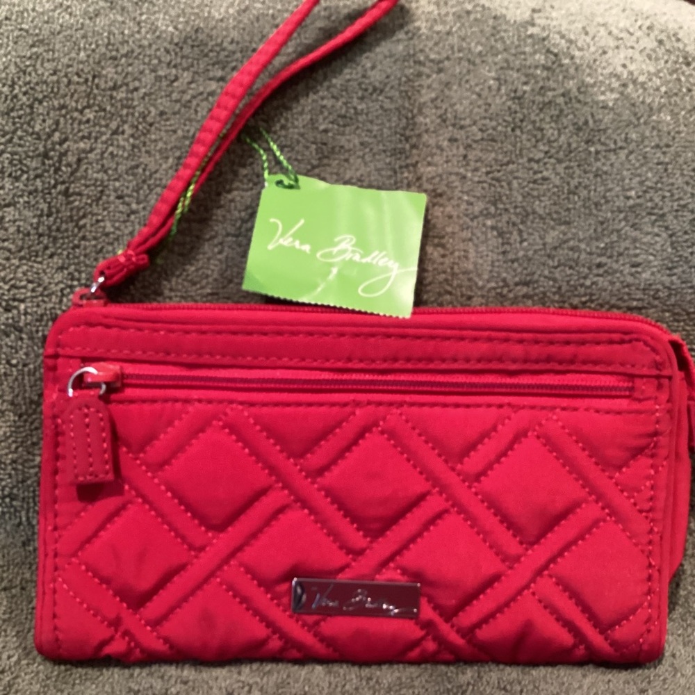 Vera Bradley cloth quitted wristlet. New with tag. Never used.